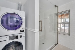 Shower, hair dryer, towels