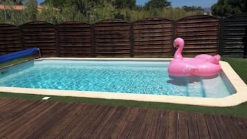 Relax by the pool with a refreshing swim or lounge on the deck.