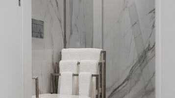 Hair dryer, towels, soap, shampoo