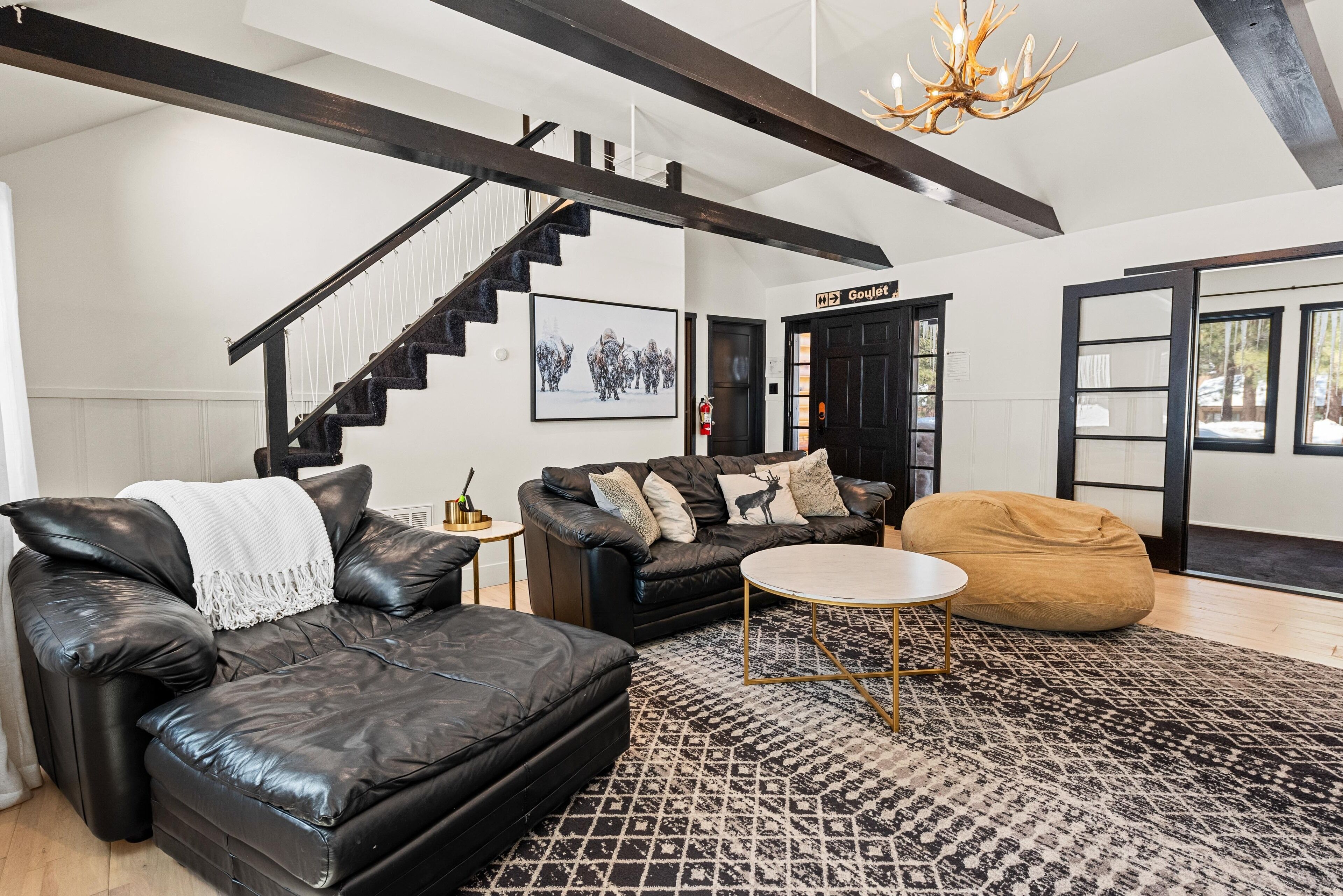 Nostalgic vibe with modern amenities in midcentury log cabin with hot tub + more