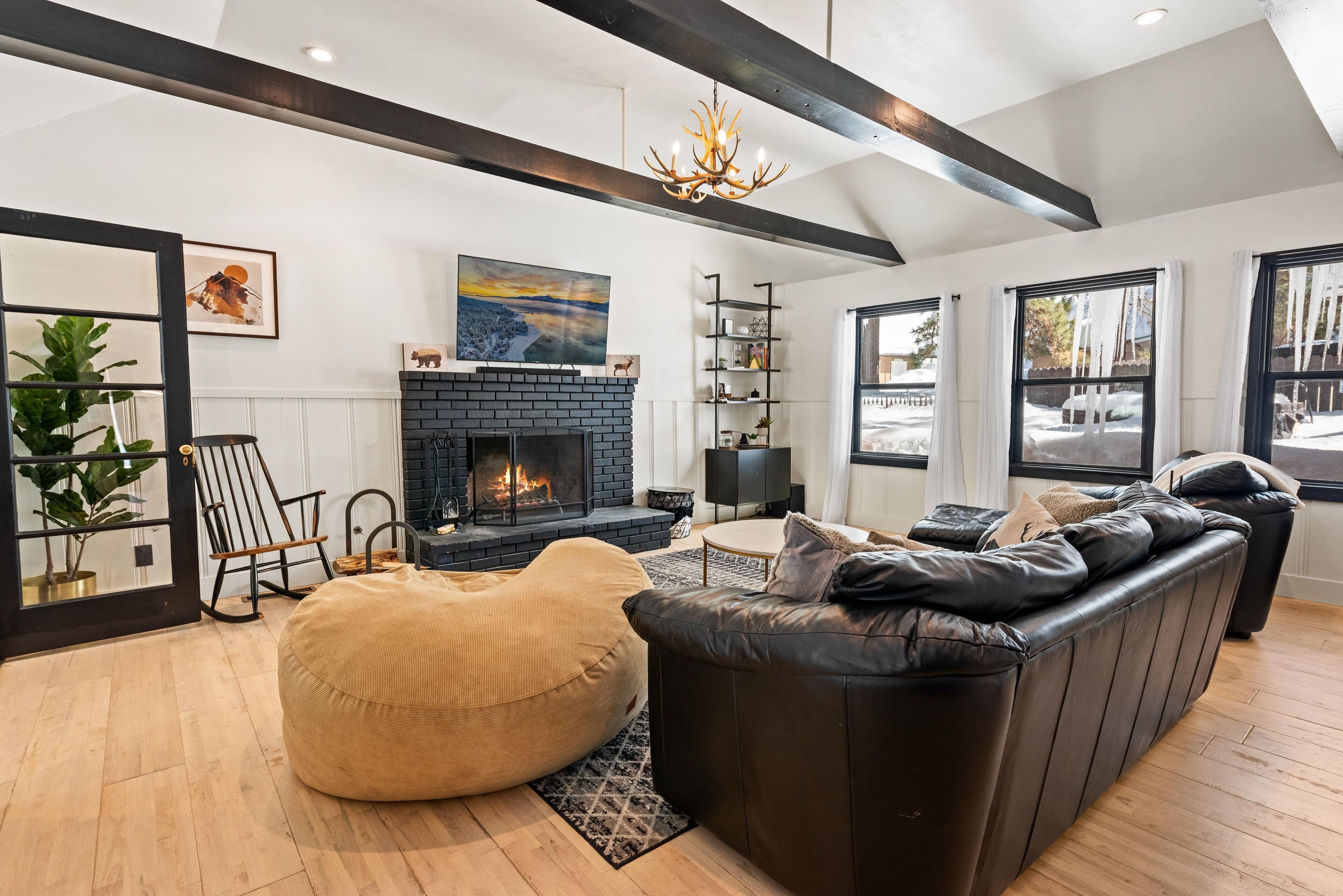 Nostalgic vibe with modern amenities in midcentury log cabin with hot tub + more