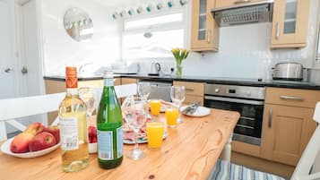 Fridge, electric kettle, toaster, cookware/dishes/utensils