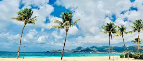 On the beach, sun-loungers, beach towels