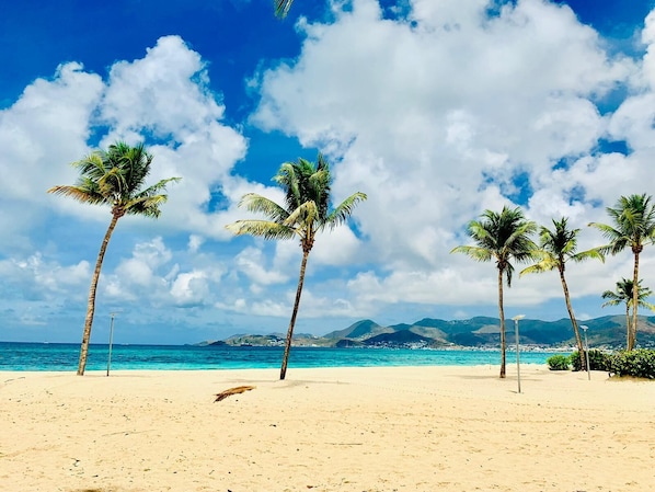 On the beach, sun loungers, beach towels