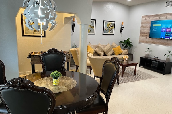 Family House, 3 Bedrooms, Ground Floor | Living area | 58-inch Smart TV with cable channels, TV