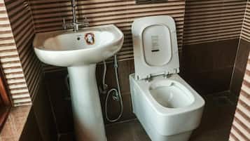 Deluxe Shared Dormitory, Multiple Bedrooms | Bathroom | Slippers, towels