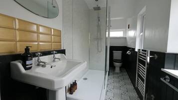 Shower, eco-friendly toiletries, hair dryer, towels