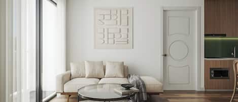 Deluxe-huoneisto | Ylelliset vuodevaatteet, tallelokero huoneessa, työpöytä