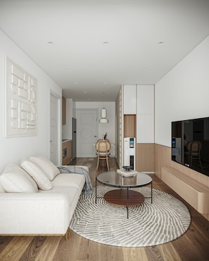 Deluxe-lejlighed | Opholdsområde | 50-tommers LED-tv med satellitkanaler