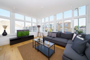 Departamento exclusivo | Área de sala de estar | Smart TV, Netflix, piso con calefacción y servicios de streaming 