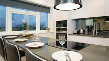 City Apartment | Private kitchen | Coffee/tea maker, fridge, microwave, stovetop