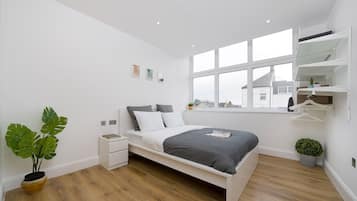 Exclusive Apartment | Desk, laptop workspace, blackout curtains, iron/ironing board