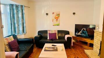 House | Living area | TV, fireplace