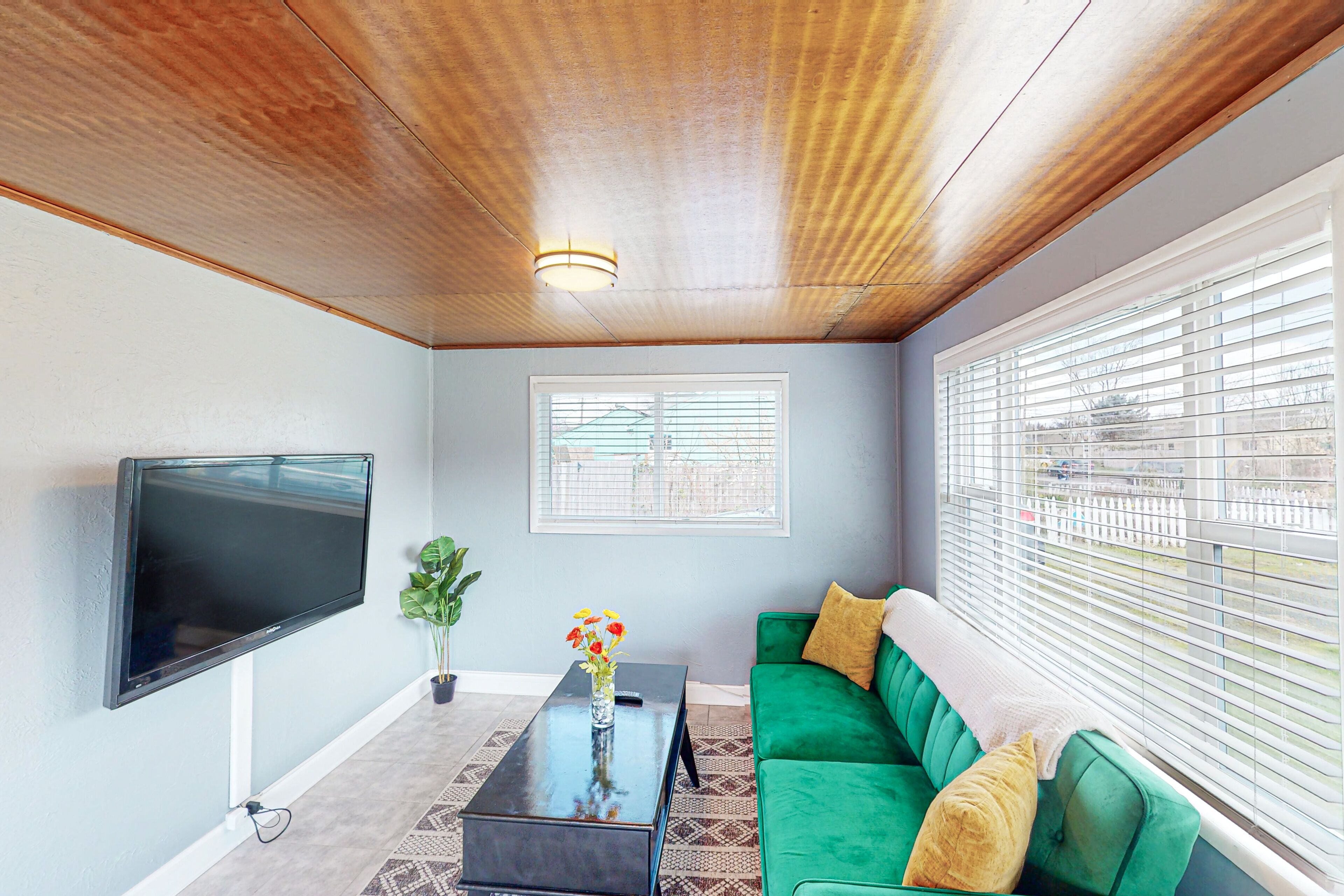 Dog-friendly home in a prime location with fenced yard, full kitchen, & foosball