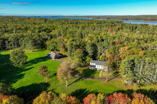 Renovated farmhouse on an acreage with grill, four-bedrooms, & W/D - river views