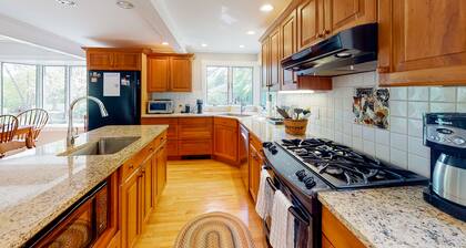 Renovated farmhouse on an acreage with grill, four-bedrooms, & W/D - river views