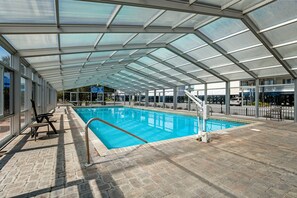 A heated pool - Coastal townhome with riverfront views, deck, & W/D - pool and athletic courts (Edisto Beach)