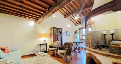 Exclusive retreat in the historic center of Lucca, overlooking Piazza Anfiteatro