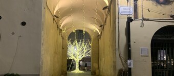 Exclusive retreat in the historic center of Lucca, overlooking Piazza Anfiteatro