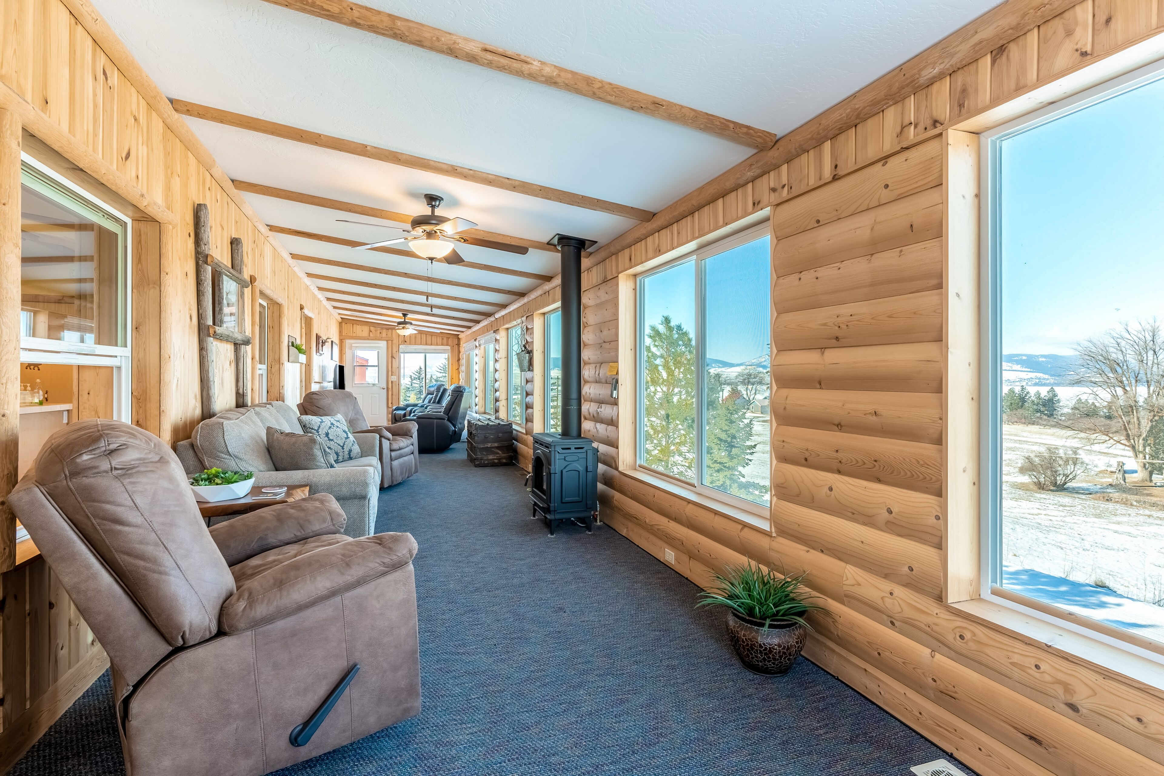 Inviting lake view home with fireplace, golf nearby, full kitchen, & W/D