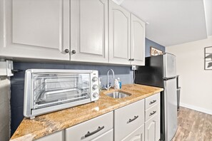 Fridge, microwave, coffee/tea maker, toaster