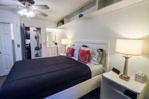 1 bedroom, desk, iron/ironing board, travel crib