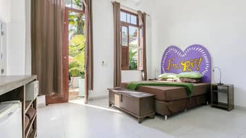 Family Quadruple Room, Garden View, Ground Floor | Pillow-top beds, minibar, individually decorated, desk
