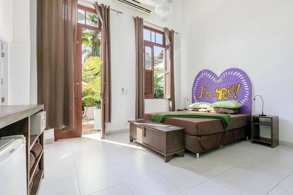 Quadrupla familiare, vista giardino, al piano terra | Materassi a doppio strato, minibar, con stile personalizzato