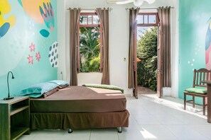 Design Quadruple Room, 1 Bedroom, Garden View, Ground Floor | Pillowtop beds, minibar, individually decorated, desk - CasaJOMO Art, Food & Music B&B (Rio de Janeiro)