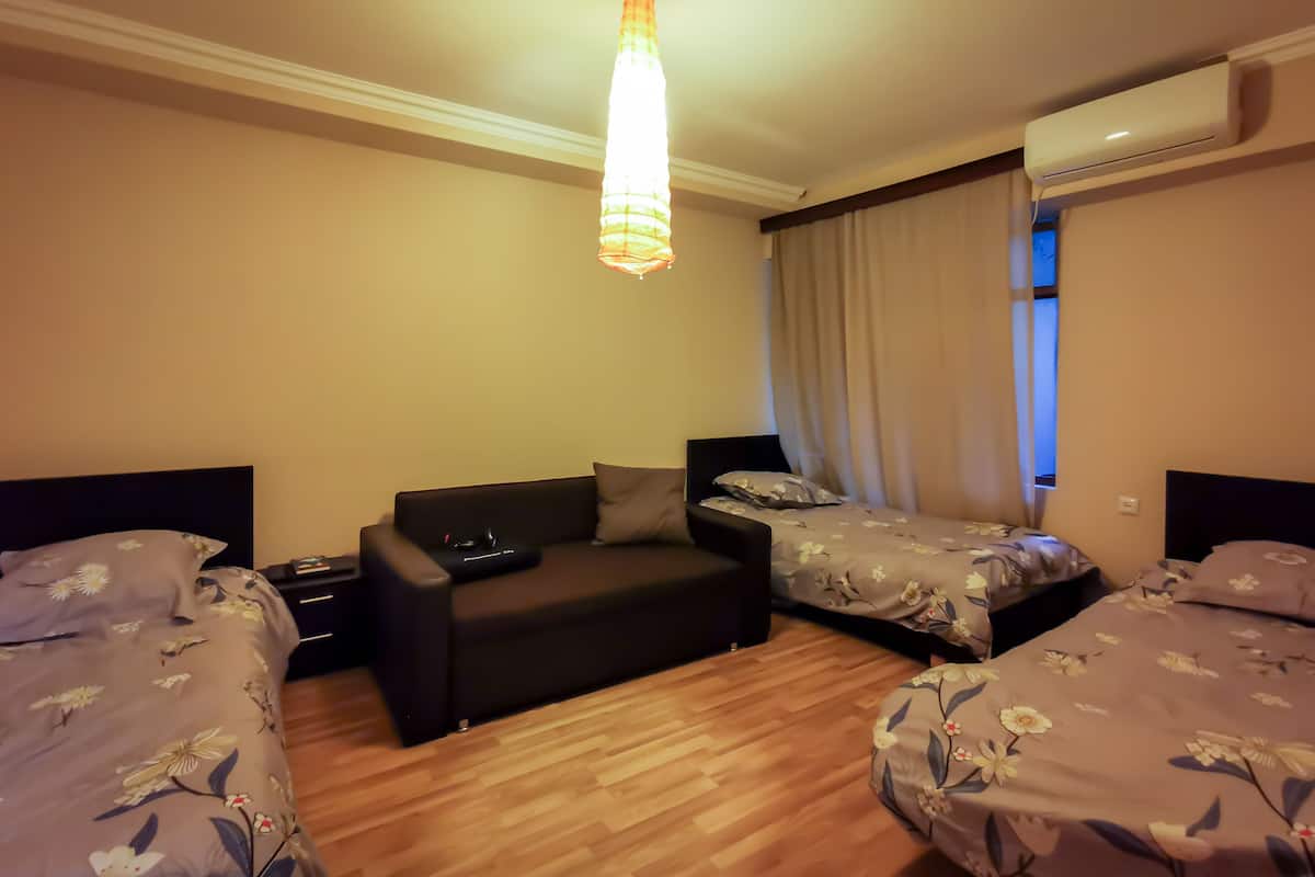 Dormitorio compartido básico | Wifi gratis y ropa de cama