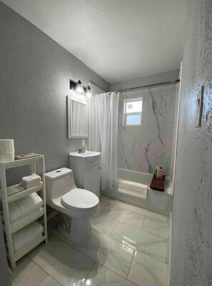 Hair dryer, towels, soap, shampoo