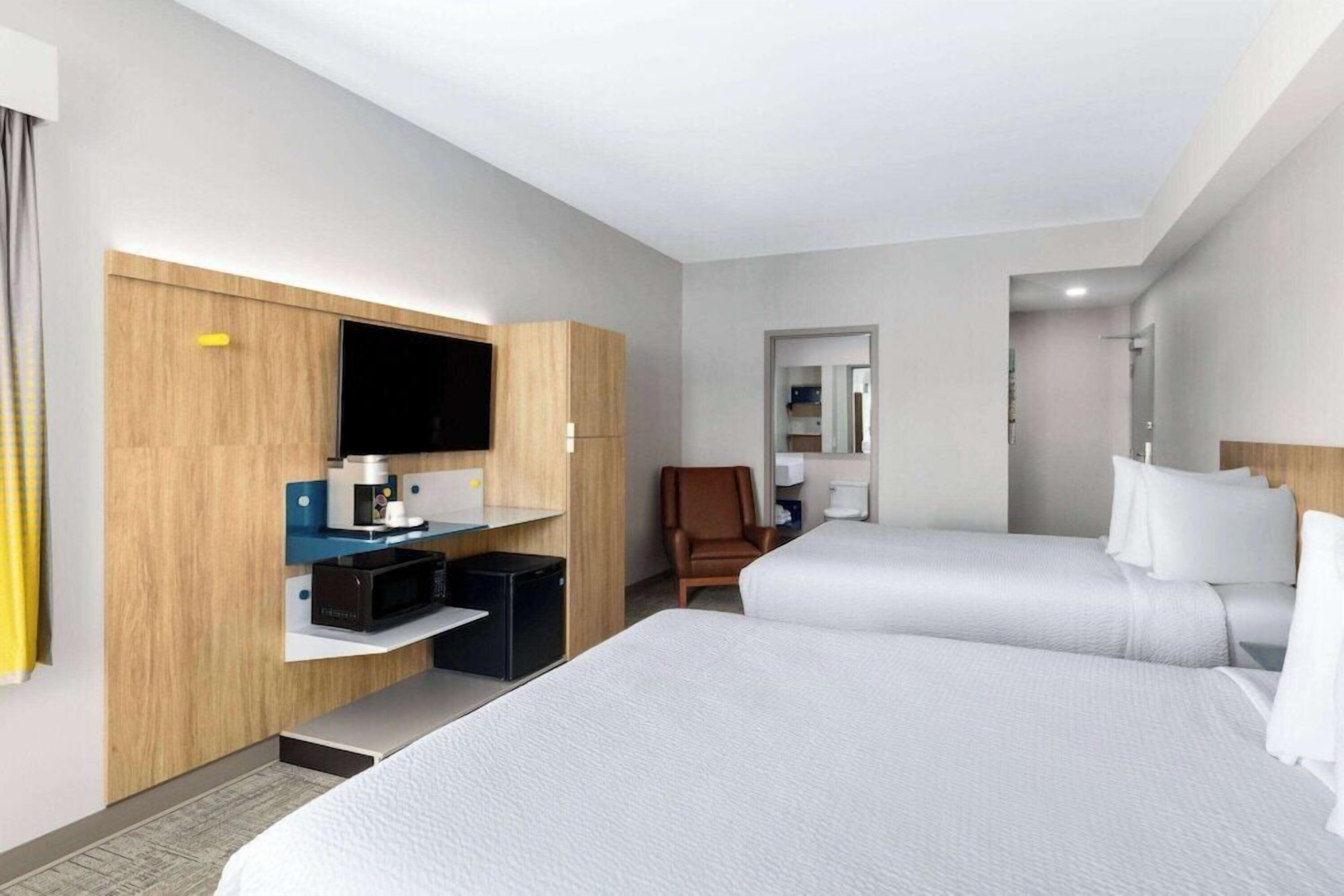 Blackout drapes, iron/ironing board, bed sheets