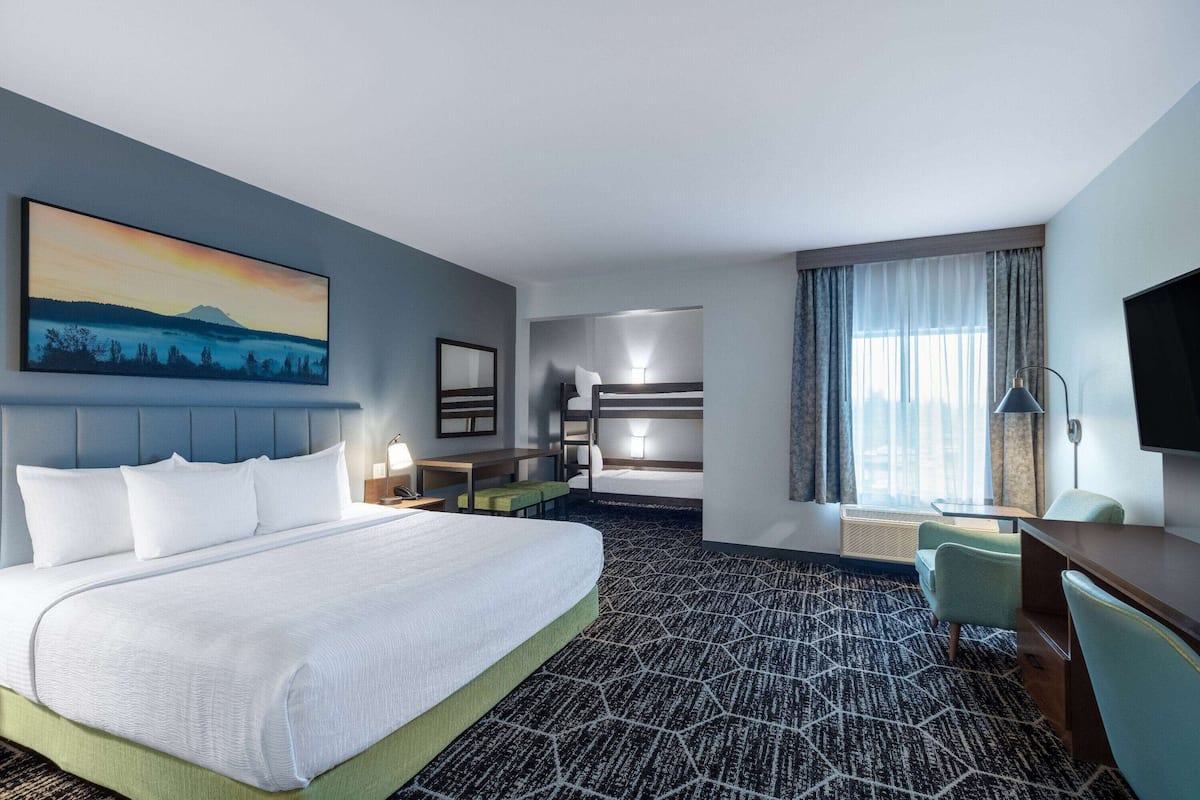 Family Suite, Multiple Beds, Non Smoking | Desk, laptop workspace, iron/ironing board, free WiFi