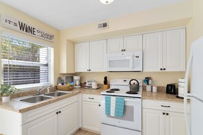 Fridge, microwave, oven, stovetop - Surfside~ Walk to the beach, Pool, BBQ, Games, Gym (Indian Harbour Beach)