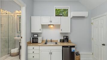 Fridge, microwave, coffee/tea maker, toaster