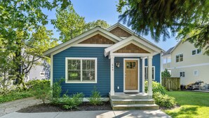 A single-story house with a front porch, a small front yard, and a mailbox. - Spacious 5BR, 3BA Waterfront Home w/Fenced Backyard & Private Boat Dock (Saugatuck)