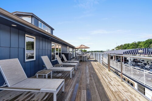 Gorgeous Downtown Penthouse with 40' Waterfront Deck Overlooking Kalamazoo River & Mt. Baldhead! 3BR 2BA (Upper Level Unit)