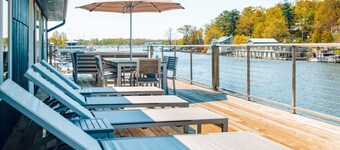 Gorgeous Downtown Penthouse with 40' Waterfront Deck Overlooking Kalamazoo River & Mt. Baldhead! 3BR 2BA (Upper Level Unit)