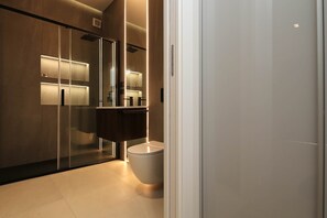 Shower, eco-friendly toiletries, hair dryer, bidet