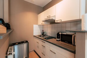 Estúdio (Urban) | Cozinha privada | Geladeira grande, micro-ondas, fogão, cooktop