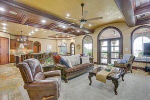 Flat-screen TV, fireplace, table tennis, books