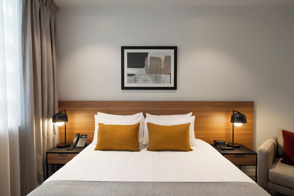 Desk, laptop workspace, free WiFi, bed sheets