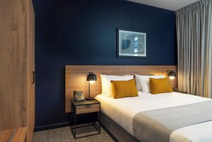 Desk, laptop workspace, free WiFi, bed sheets