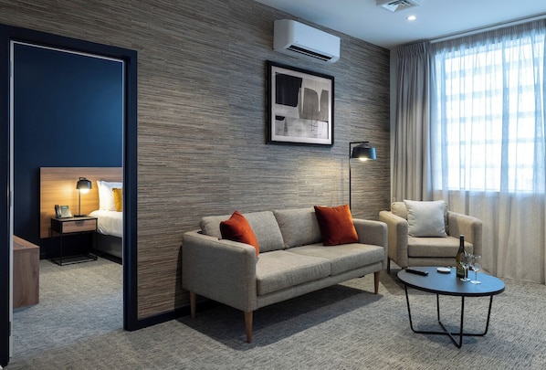 Apartment, 1 Schlafzimmer | Wohnbereich | LED-Fernseher, iPod-Dockingstation, aktuelle Filme, Streaming-Dienste