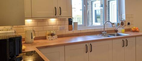 Lavavajillas y periquera