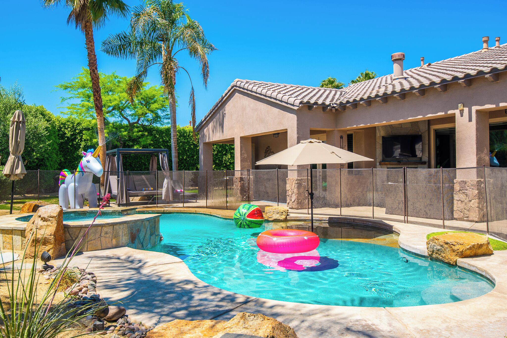 Outdoor pool, free pool cabanas, pool umbrellas