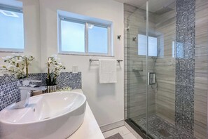 Shower, hair dryer, towels, soap