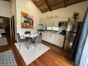 Dining - Cabin style home located in residential area  a mile from beach. (Puerto Carrillo)