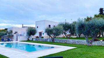 Seasonal outdoor pool, pool umbrellas, sun loungers