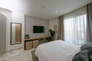 1 dormitorio, tabla de planchar con plancha, wifi gratis y ropa de cama